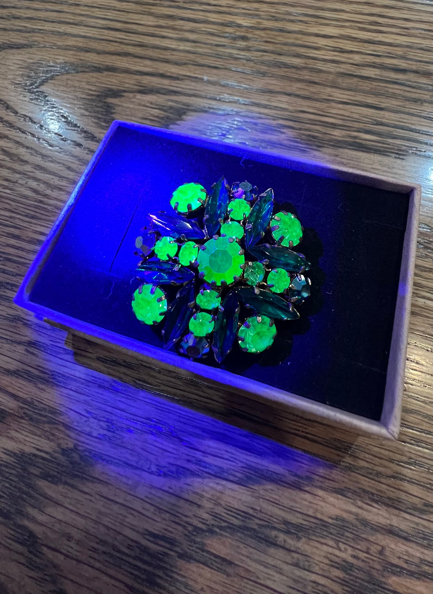 Uranium brooch